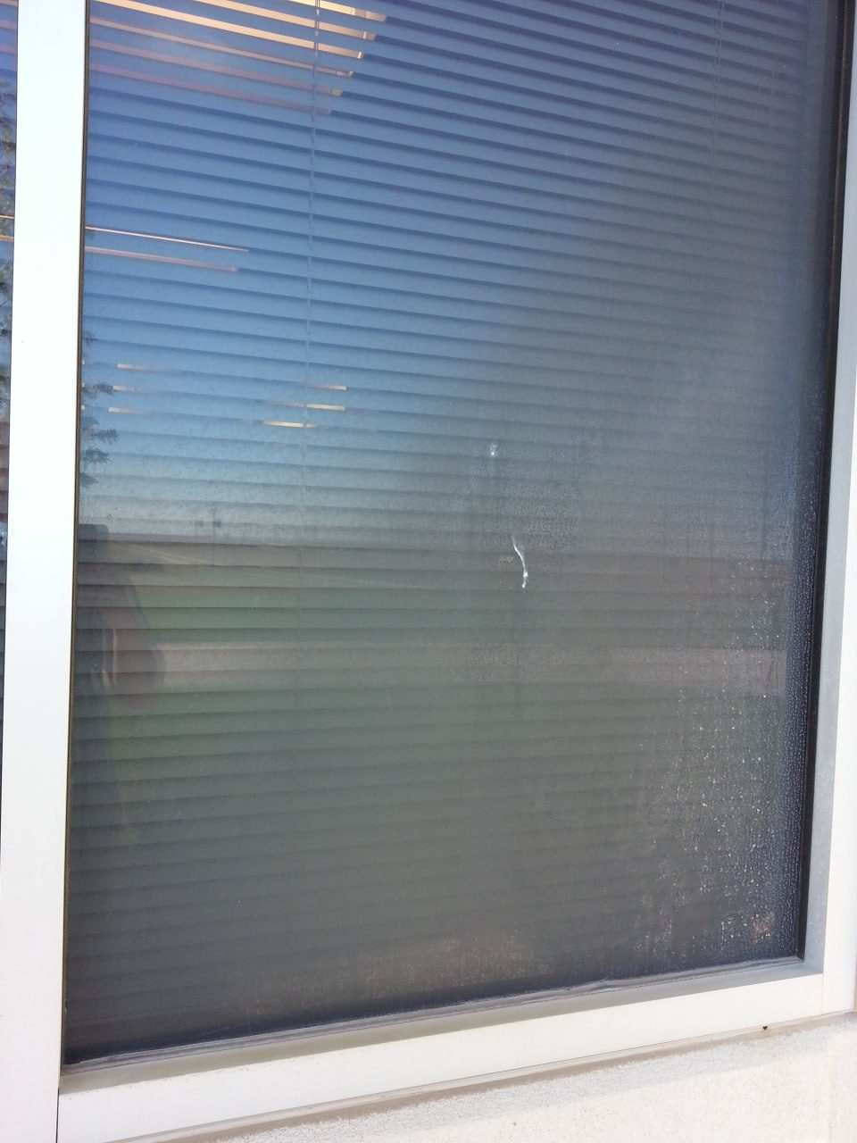 Window before professional cleaning